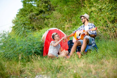 Photo for Guitar music and camping - Royalty Free Image