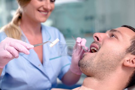 Photo for Happy patient at the dentist. - Royalty Free Image