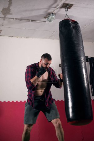 Photo for Fighter practicing in gym - Royalty Free Image