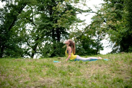 Photo for Yoga exercise in nature - Royalty Free Image