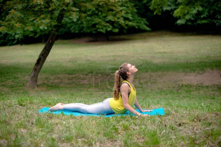 Photo for Yoga exercise in nature - Royalty Free Image