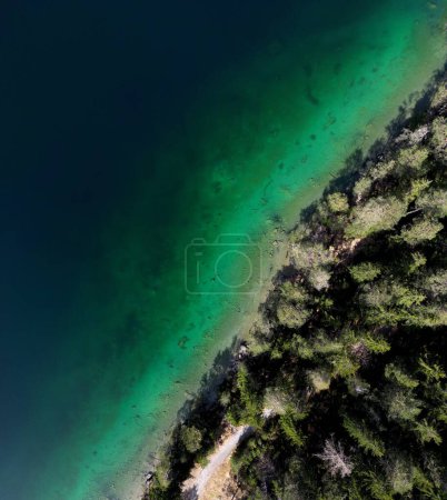 Social Media Format Top Down Aerial Droneshot of Blindsee Lake in Germany Austria Tirol Turquoise Green Water. High quality photo