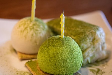 Photo for Matcha green tea ice cream served with cake - Royalty Free Image