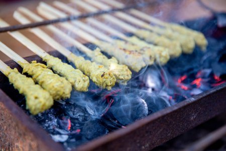 Photo for Balinese chicken satay on the grill - Royalty Free Image