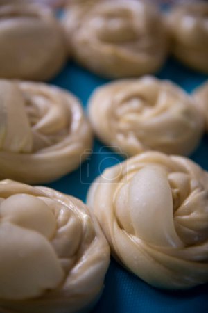 Photo for Rolled up uncooked roti canai dough Close Up - Royalty Free Image