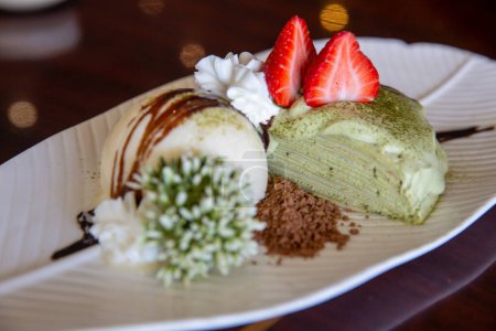 Photo for Green Tea Layered Cake with Ice Cream - Royalty Free Image