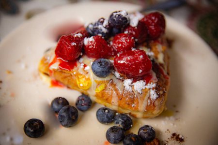 Photo for Stuffed French Toast with Berries with powdered Sugar - Royalty Free Image