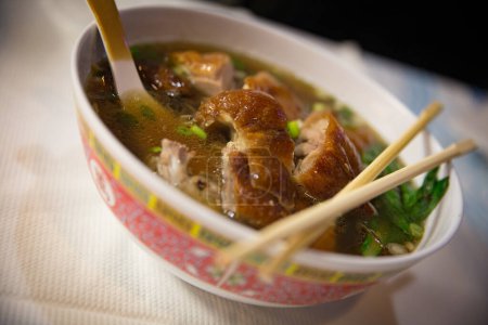 Photo for Roast Duck Noodle Soup with chop sticks - Royalty Free Image