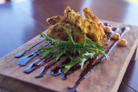 Photo for Fried avocado fries with eel sauce and mayonnaise - Royalty Free Image