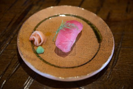 Photo for Fresh ahi tuna sushi with ginger and wasabi - Royalty Free Image