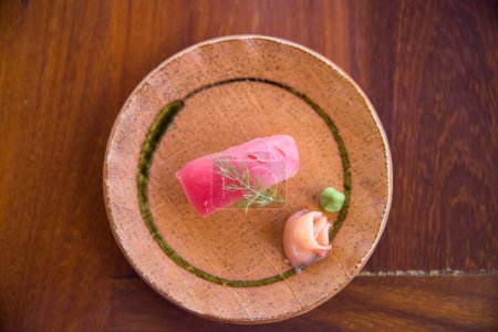 Photo for Fresh ahi tuna sushi with ginger and wasabi - Royalty Free Image