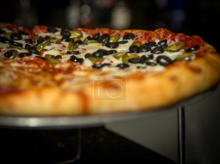Photo for Jalepeno and Black olive pizza with extra cheese - Royalty Free Image