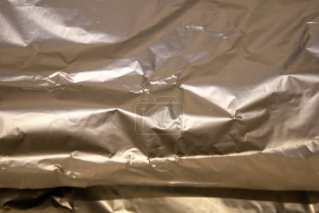 Photo for Aluminum foil sheet ready for wrapping or covering - Royalty Free Image