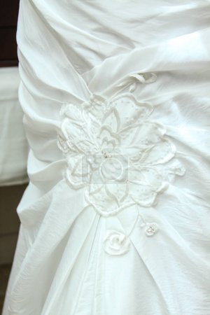 Wedding dress detail shown close up