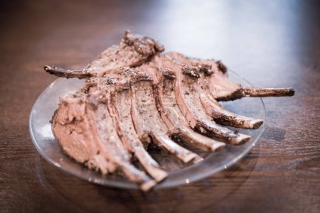 Frenched rack of lamb on a served on a plate