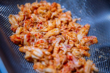 Heap of Crawfish Tails being strained