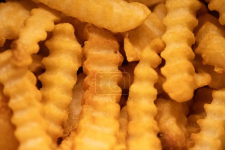 Téléchargez les photos : Air Fried Crinkle Fries plan rapproché - en image libre de droit