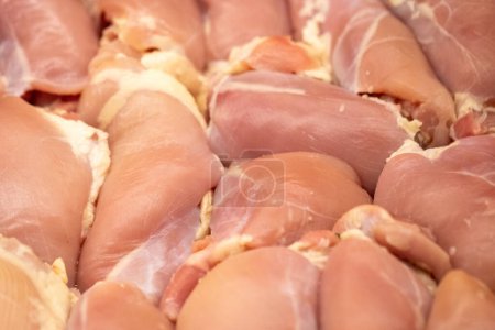 Stack of Raw Chicken Breasts for sale