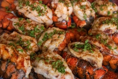 Photo for Bunch of Broiled Lobster Tails for a dinner party - Royalty Free Image