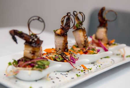 Grilled Octopus and Pork Belly as a sharreable appetizer