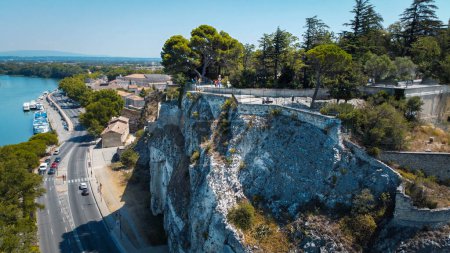 Belvdre Panoramique du Rhne panoramic terrace in Avignon, a natural rock face overlooking a beautiful view of the Rhne river and the city. Aerial view of a public park and the city of Avignon. Tourist destination located in Provence in France