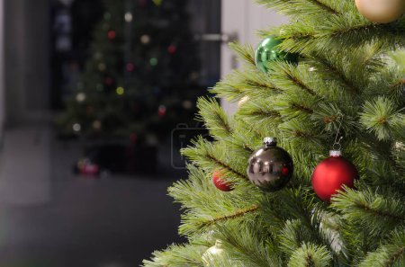Photo for Christmas tree reflected in night window. Black, red, green balls on branches. background, copy space, text space, postcard - Royalty Free Image
