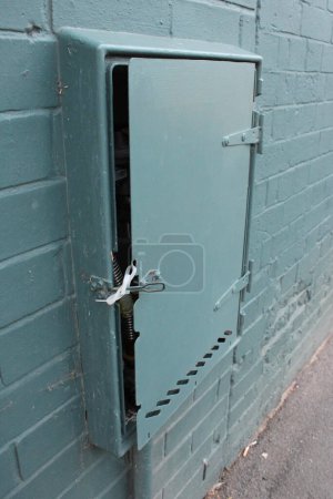 Photo for Green Gas utility box with broken lock - Royalty Free Image