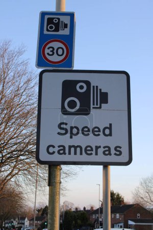 Photo for Speed camera signs enforcing a 30 MPH zone - Royalty Free Image
