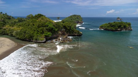 Photo for The view is very beautiful, you can see the cliffs and small islands on Ungapan Beach, Indonesia - Royalty Free Image