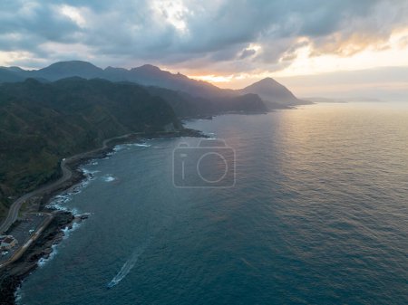 Photo for Aerial view of Bitoujiao lighthouse, a famous scenery of Taiwan northeast corner. Birds eye view in Bitoujiao cape, Ruifang district, New Taipei, Taiwan. - Royalty Free Image