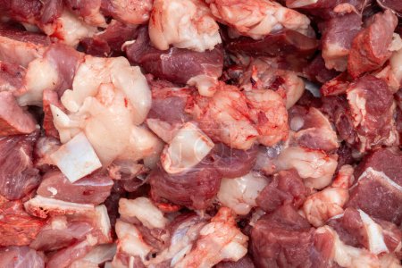 Frisch gehacktes rohes Rindfleisch Hintergrund. Rotes Fleisch ist eine reiche Proteinquelle, die Ihnen hilft, Ihre Muskeln aufzubauen und Ihr Gewicht zu erhöhen.
