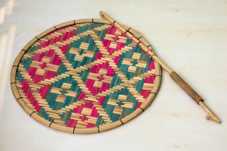 Traditional handmade hand fan. Beautiful hand fan is made of bamboo cane. Locally in Bangladesh, it is called Hat Pakha.