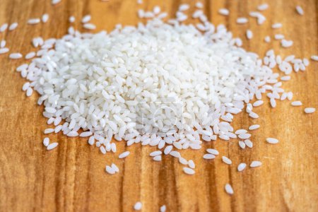 Food rice on a wooden background.