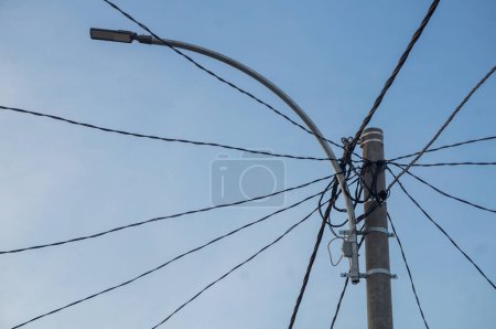 Photo for Electric poles against a clear sky - Royalty Free Image