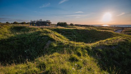 Photo for View of Pointe du Hoc in French Normandy at sunset. - Royalty Free Image