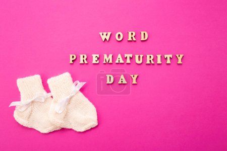 Photo for World Prematurity day concept. Banner with the inscription in wooden letters. - Royalty Free Image
