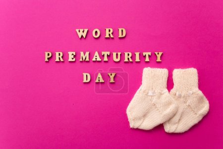 Photo for World Prematurity day concept. Banner with the inscription in wooden letters - Royalty Free Image