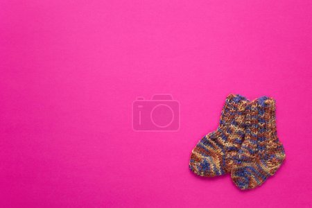 Photo for World Prematurity day concept. Banner with the pair of socks.. - Royalty Free Image