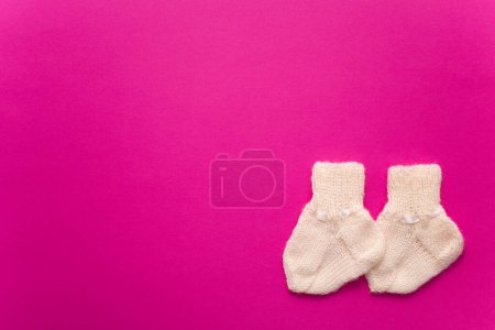Photo for World Prematurity day concept. Banner with the pair of socks. - Royalty Free Image