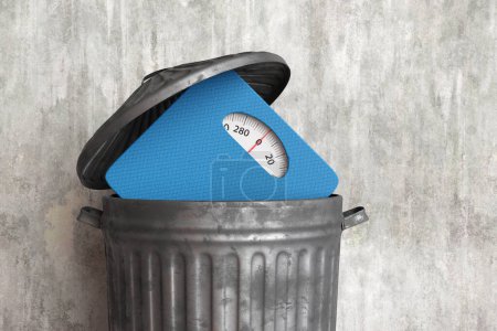 Balance de poids analogique bleue dans une poubelle métallique argentée devant un mur de plâtre sale. Illustration du concept d'abandon des modes de vie sains et d'abandon des séances d'entraînement