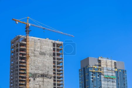 Photo for The subject of the photo is the construction of a building of a business center or residential building - Royalty Free Image