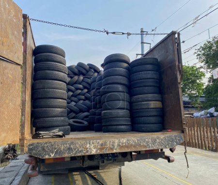 Photo for Waste Used tires transported by truck - Royalty Free Image