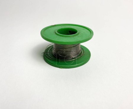 Photo for A roll of green solder tin - Royalty Free Image
