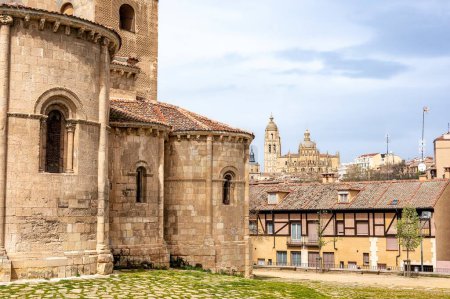 Church of San Millan, built in the 12th century in Romanesque style, with views of the Cathedral in the Spanish city of Segovia