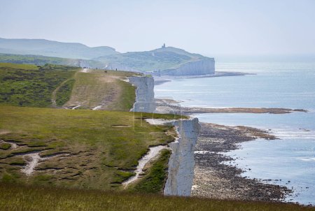 Photo for View of the brows and bottoms of the Seven sisters looking back to Birling Gap from Cuckmere Haven on the east Sussex coast south east England - Royalty Free Image