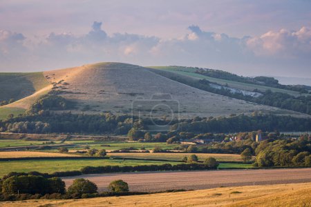 Photo for August sunset from mount Caburn over the Lewes downs east Sussex south east England UK - Royalty Free Image