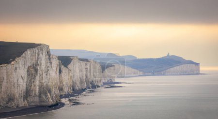 Photo for Dramatic cliff face of the Seven sisters between Cuckmere Haven and Birling Gap on the east Sussex coast south east England UK - Royalty Free Image