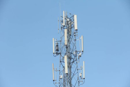 Photo for Telecommunication tower on blue sky background - Royalty Free Image