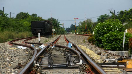 Railway line intersections at train stations in Indonesia