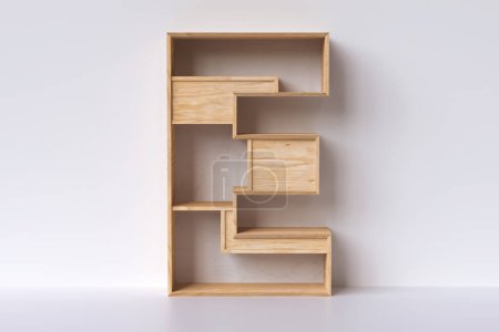 Téléchargez les photos : Alphabet 3D en bois lettre E, faite de planches de contreplaqué de pin, menuiserie décorative et concept de meubles. rendu 3D - en image libre de droit